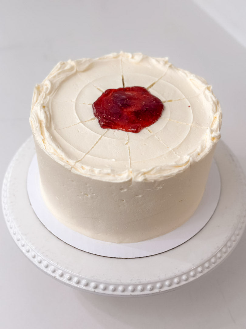 Vanilla Cake with Raspberry Preserves